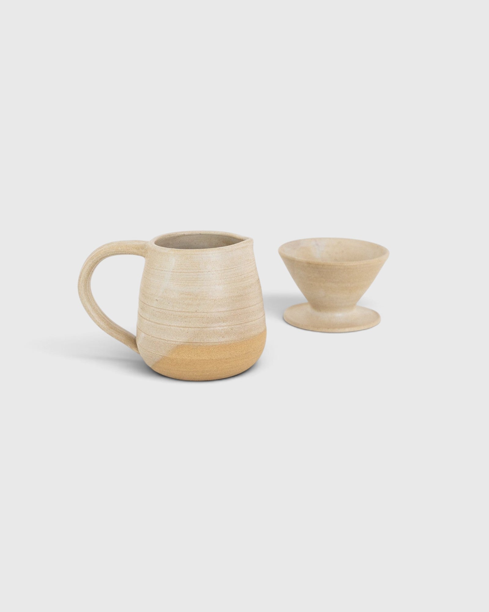 JONES + CO handmade stoneware pitcher and pour over coffee set with a soft glaze and raw clay base.