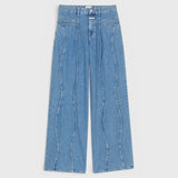 JONES + CO Tali-X wide-leg denim jeans in mid blue with signature curved seaming and high-waist fit.