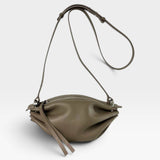 JONES + CO Bon-Bon taupe bovine leather shoulder bag with pleated ends, adjustable strap, and silver metal hardware.