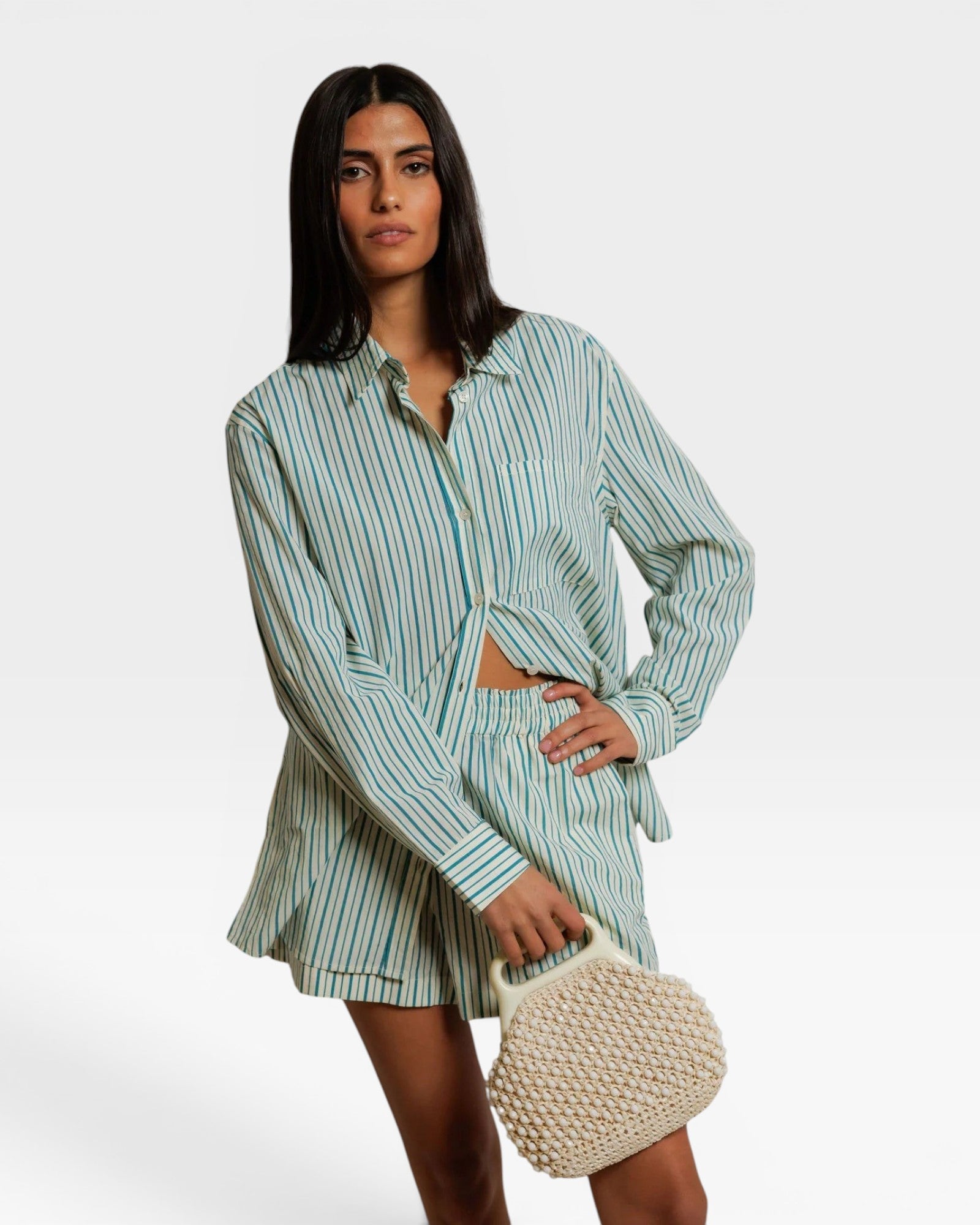 JONES + CO Avalon teal blue and sugar stripe cotton poplin button-down shirt and matching shorts set on a model