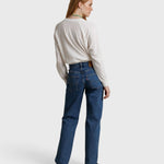 JONES + CO Jasper textured jersey crew neck sweater in natural worn with blue jeans by a woman, back view