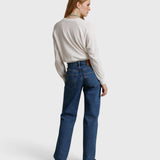 JONES + CO Jasper textured jersey crew neck sweater in natural worn with blue jeans by a woman, back view