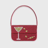 JONES + CO Tommy hand-beaded shoulder bag in red with a martini glass and olive print and vegan leather piping.