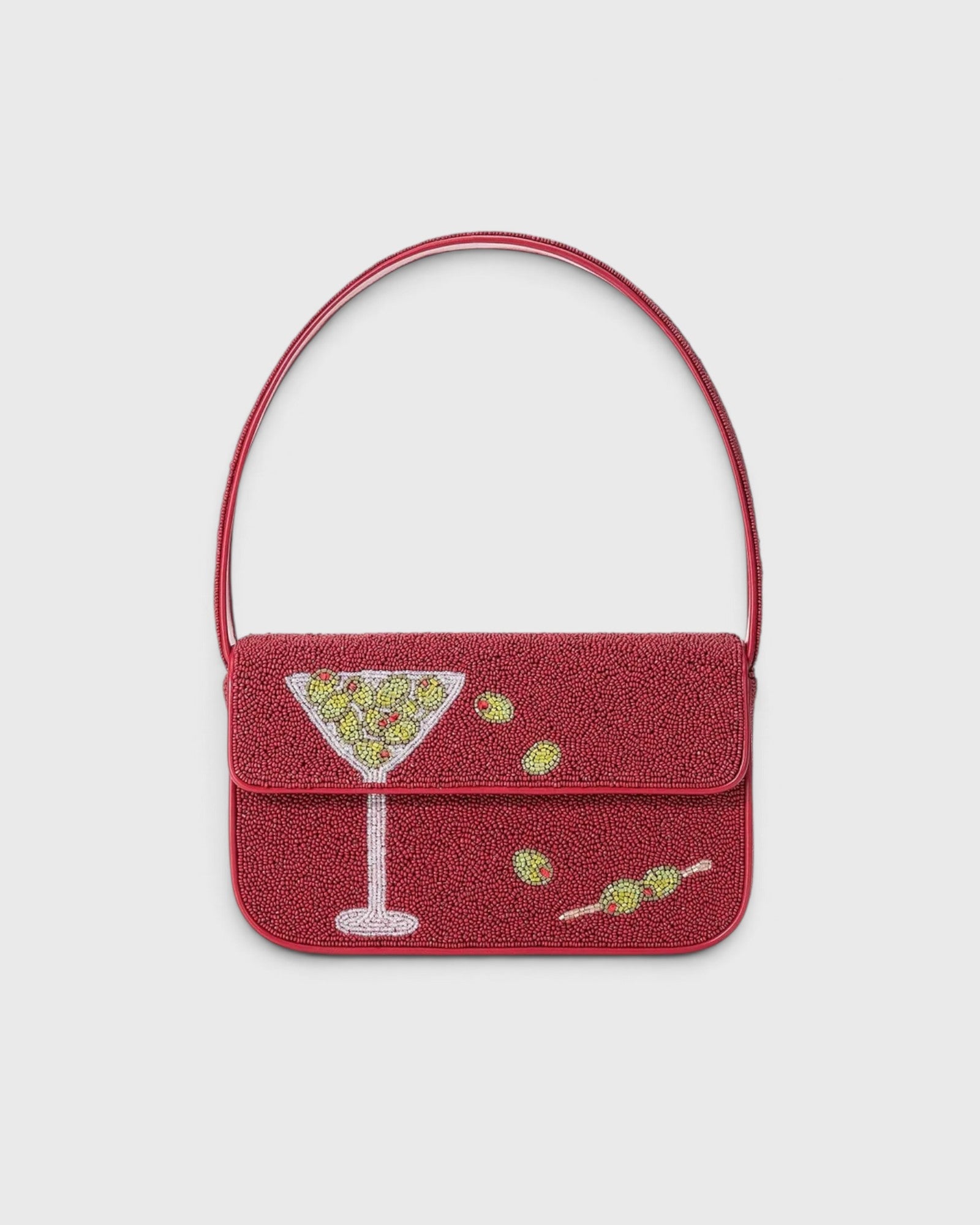 JONES + CO Tommy hand-beaded shoulder bag in red with a martini glass and olive print and vegan leather piping.