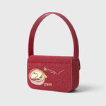 JONES + CO Tommy beaded shoulder bag in red with a playful martini glass graphic and vegan leather piping.
