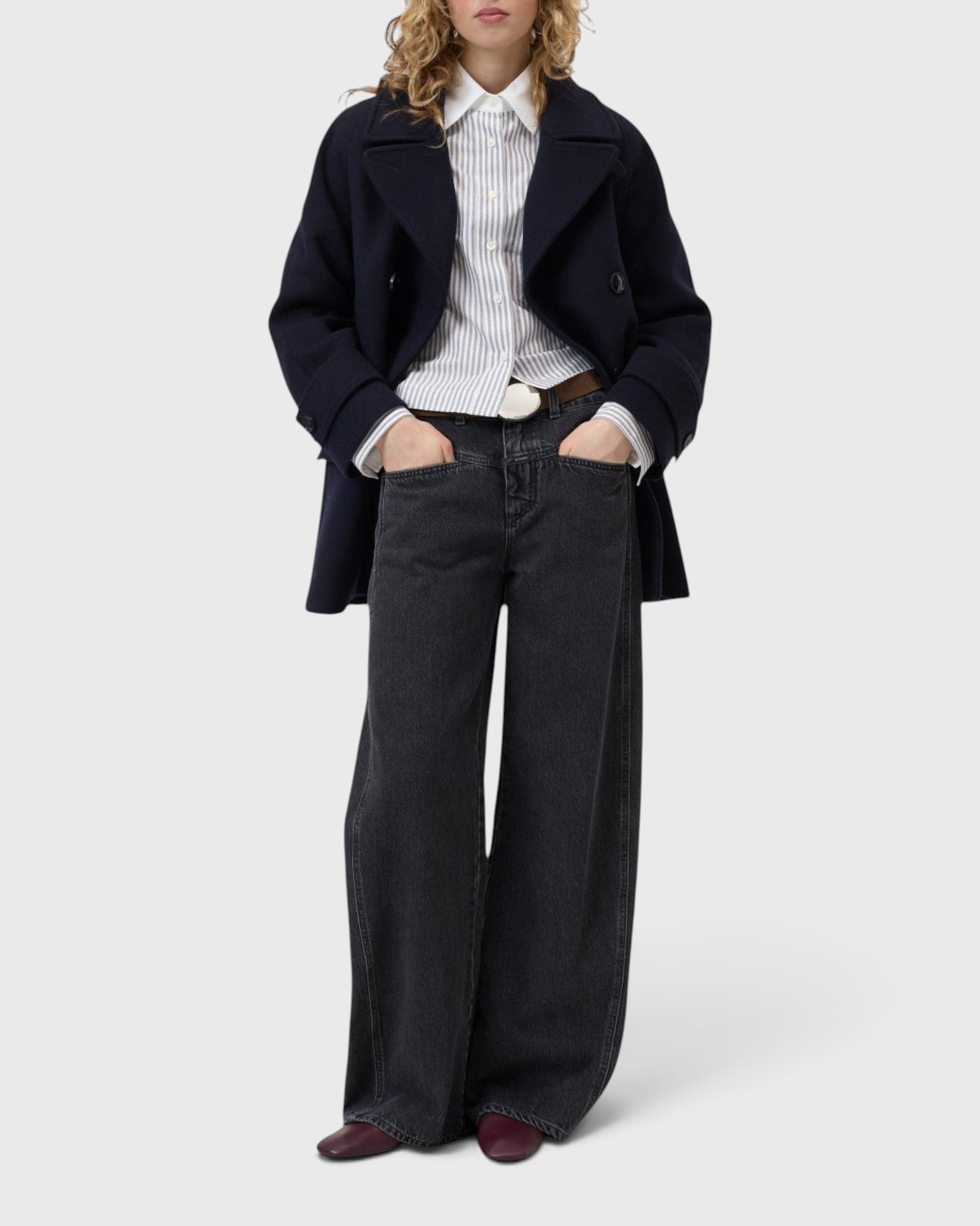 JONES + CO Tori X dark gray barrel fit denim jeans with iconic X-pockets and offset side seams on a model