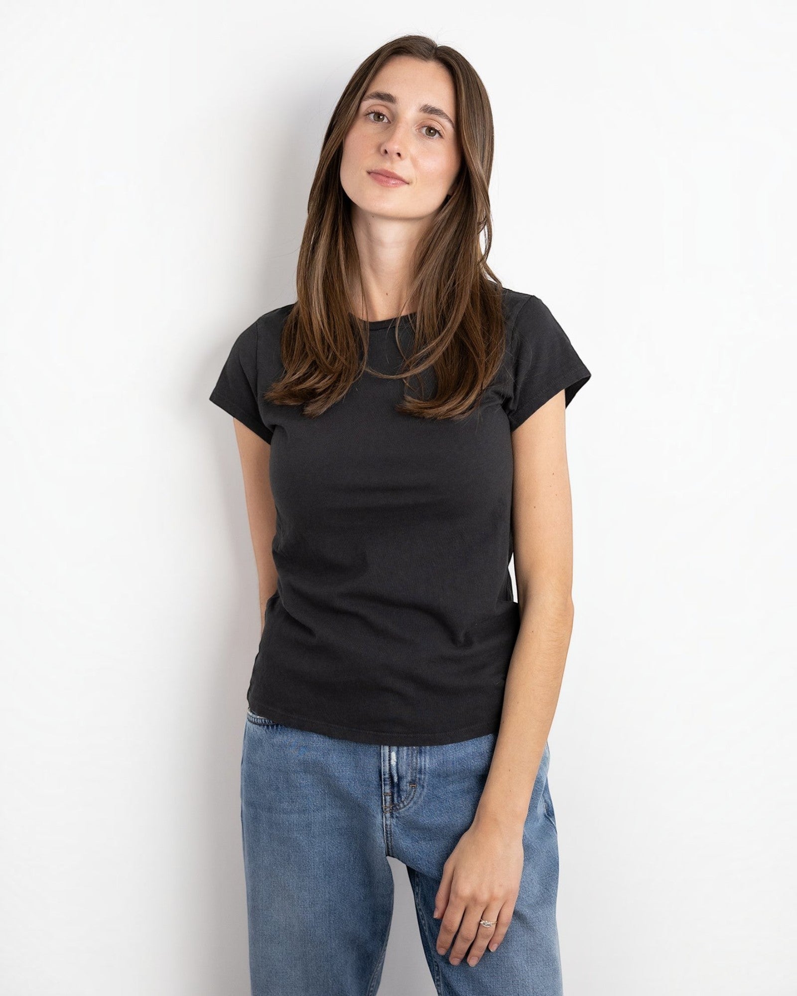 JONES + CO Sheryl baby tee in vintage black, made from recycled and organic cotton with a 90s-inspired fit.