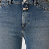 JONES + CO Wera mid blue denim jeans featuring high waist and iconic X-pockets detail