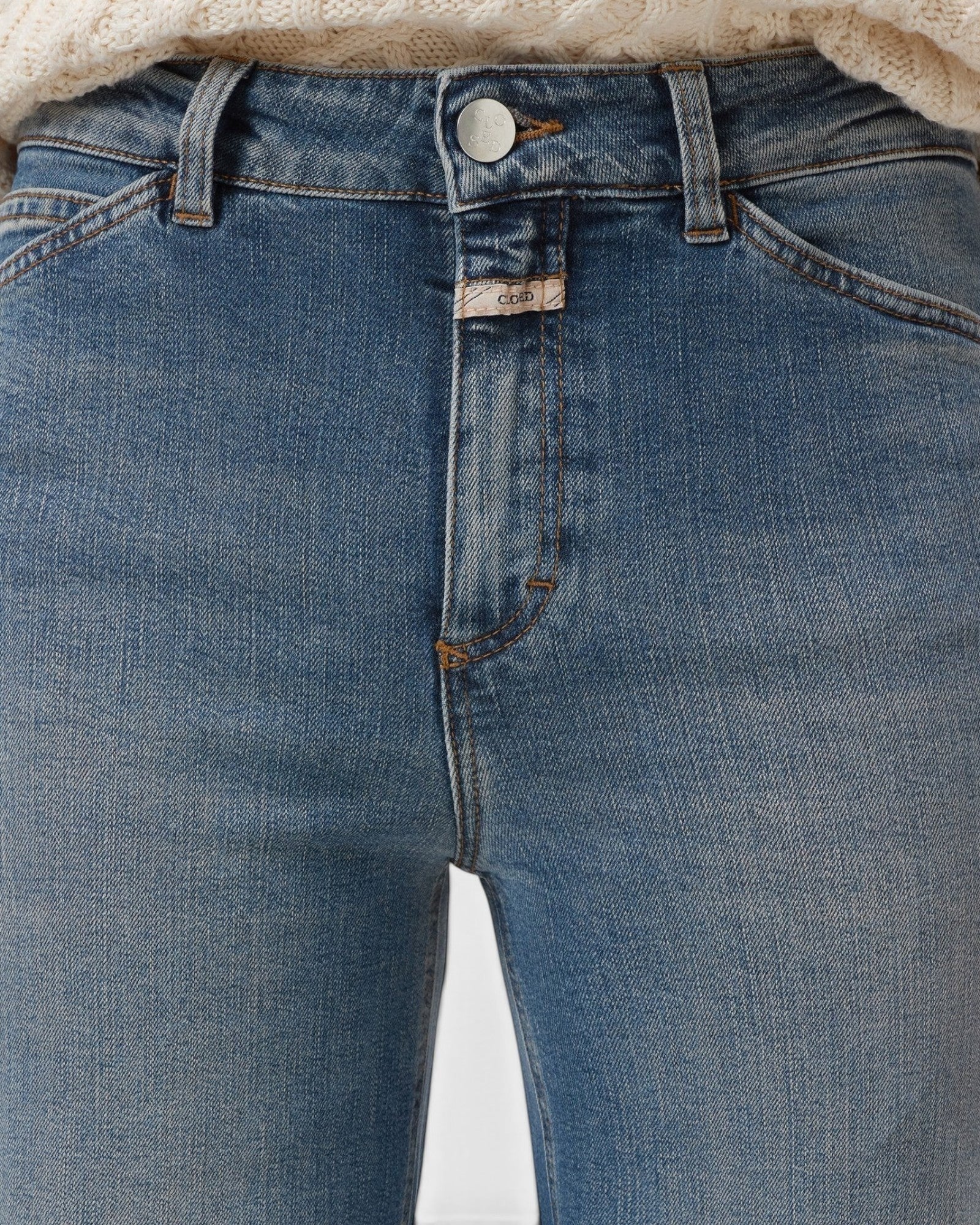 JONES + CO Wera mid blue denim jeans featuring high waist and iconic X-pockets detail