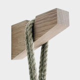 JONES + CO handmade square notched wall mount bracket crafted from untreated white oak with a hanging rope detail.