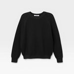 JONES + CO Ziggy sweatshirt in true black with a shrunken fit and textured fabric, featuring cropped sleeves.