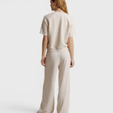 JONES + CO Ziggy short sleeve sweatshirt in sugar cream with raglan sleeves, worn with matching wide-leg trousers
