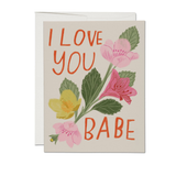 Greeting card with floral design and 'I love you babe' text on a beige background