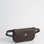Brown leather waist bag on a light gray background