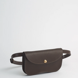 Brown leather waist bag on a light gray background