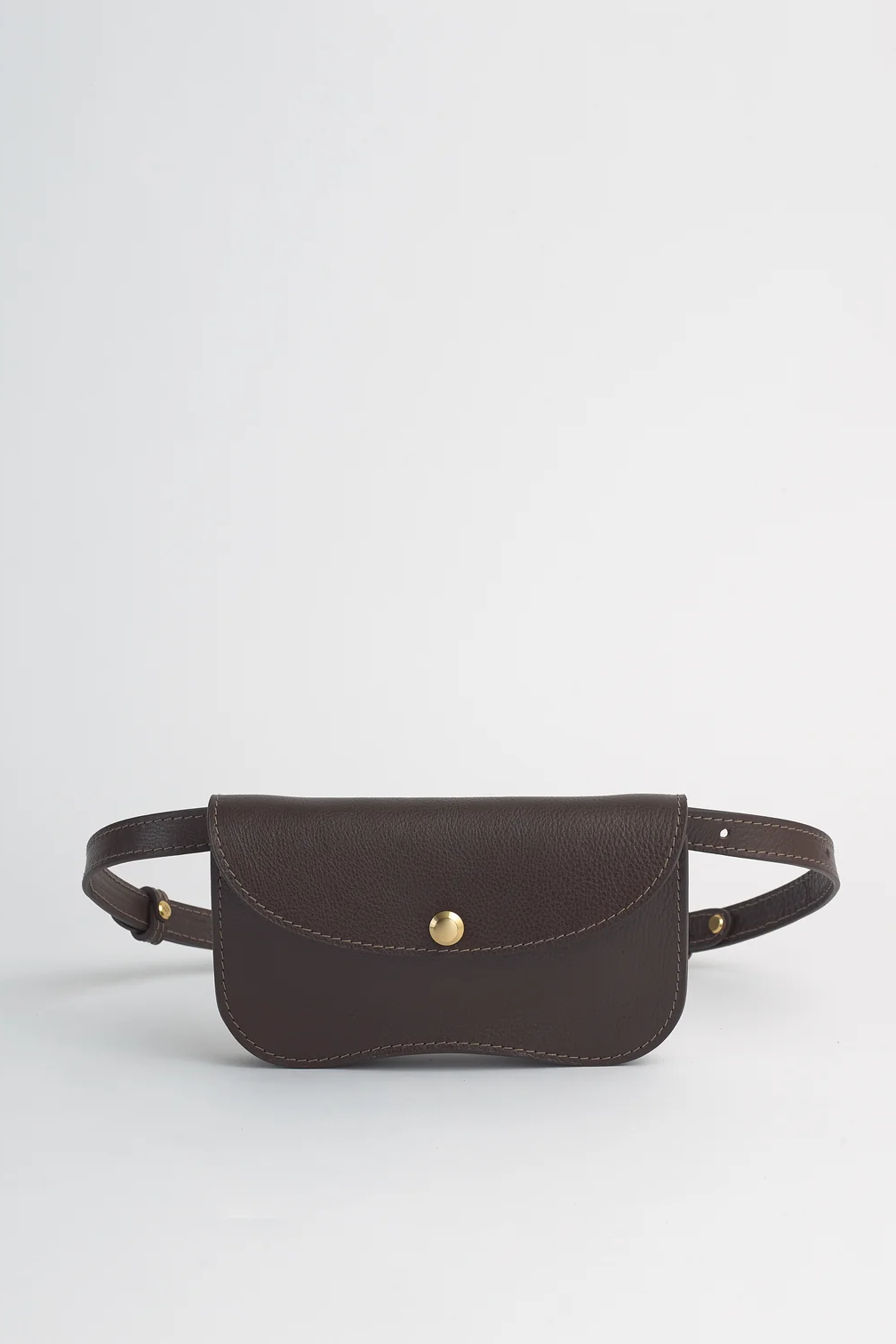 Brown belt bag with gold buckle on a light gray background