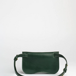 Green leather handbag on a white background