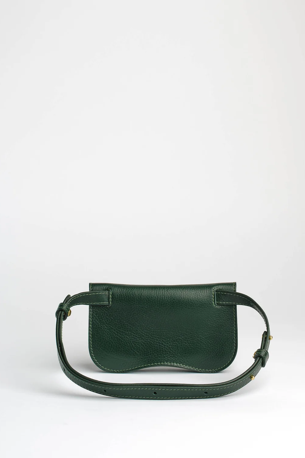 Green leather handbag on a white background