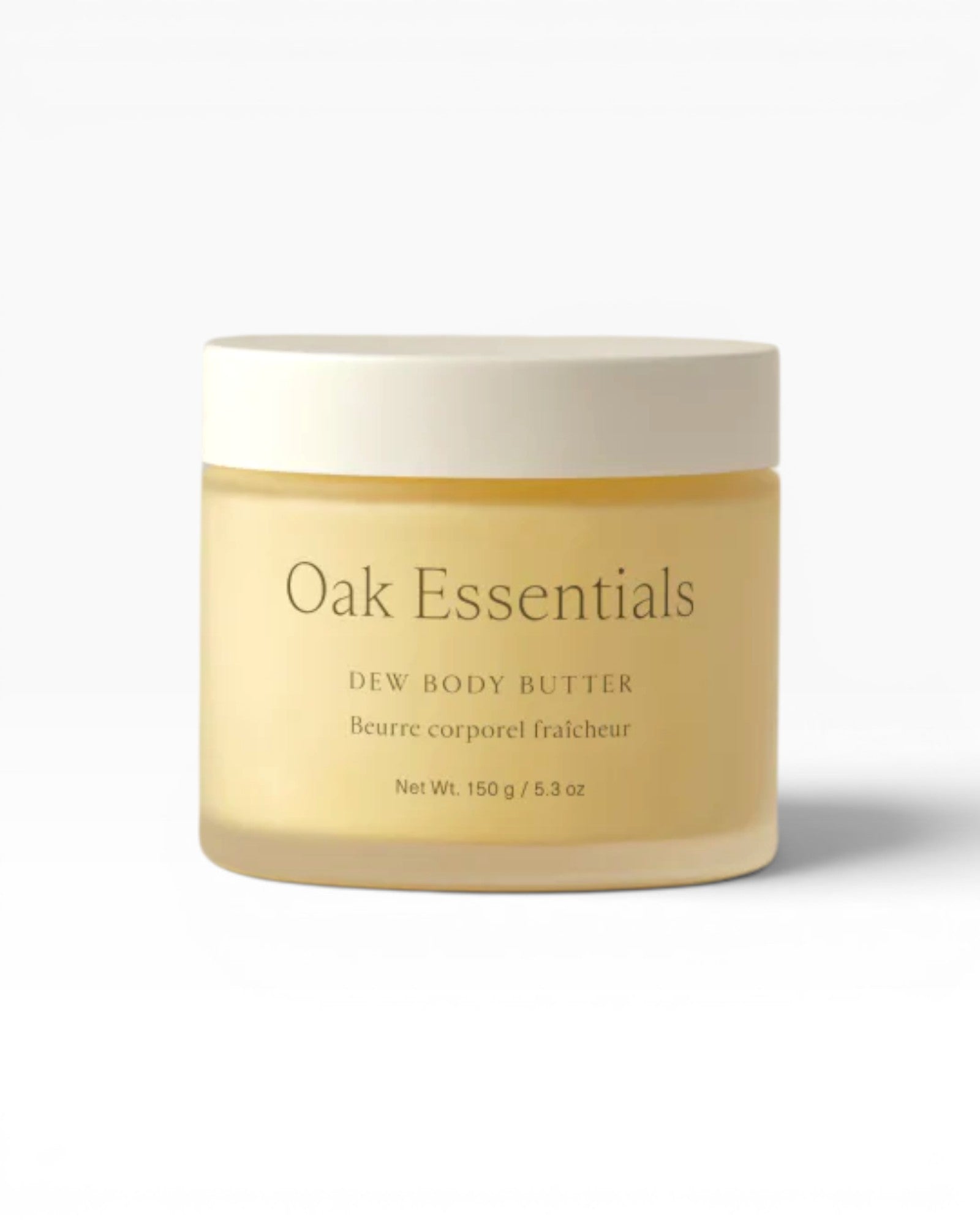 Jar of Oak Essentials Dew Body Butter on a beige background