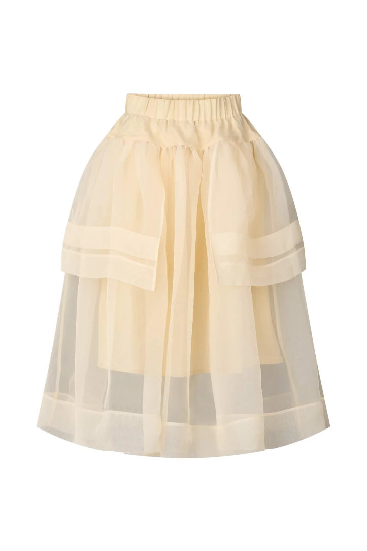 Beige skirt with layered design on a white background