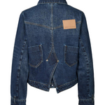 Blue denim jacket with a brown patch on a white background