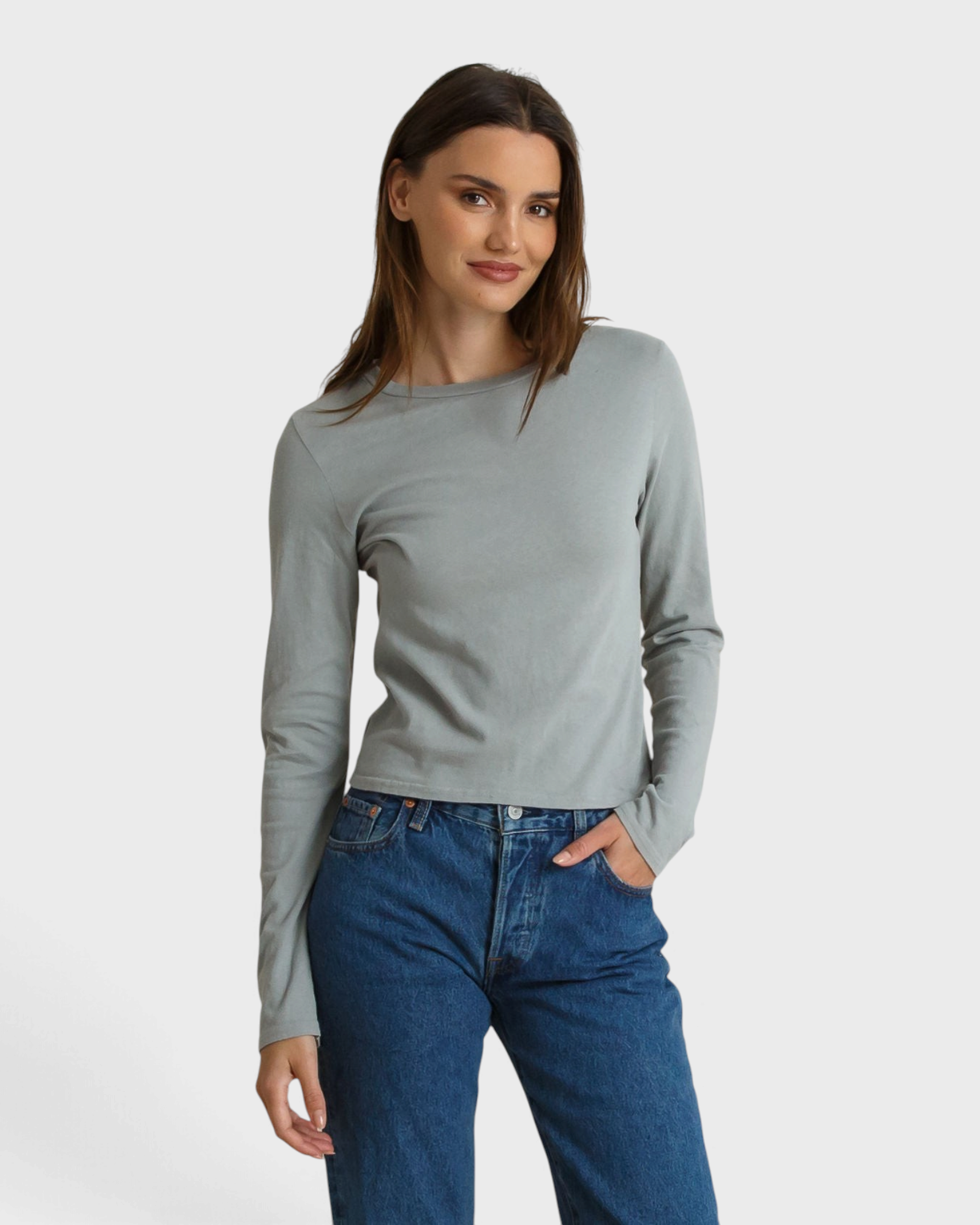 JONES + CO Lisa long sleeve top in griffin grey recycled cotton worn by a model with blue jeans