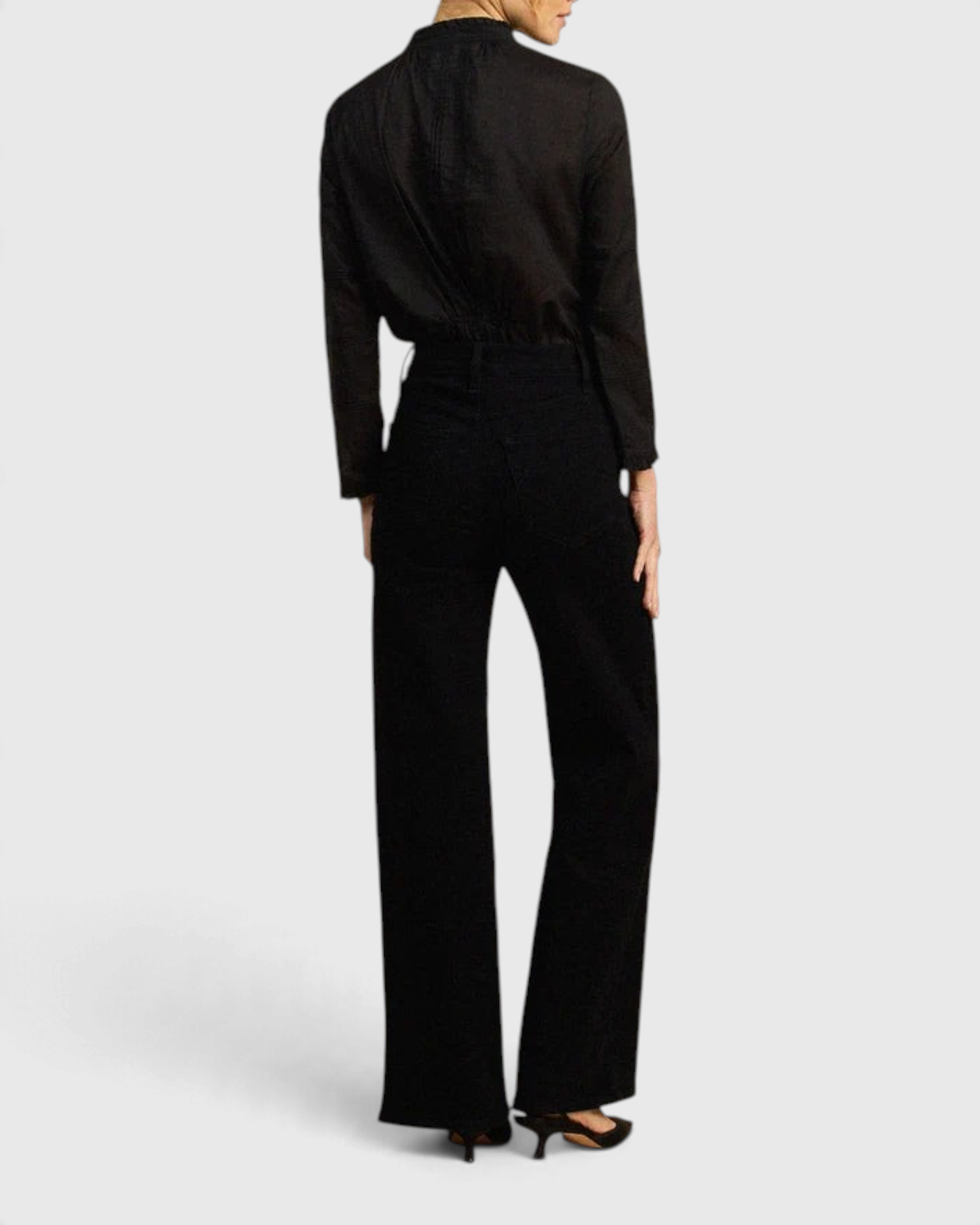 JONES + CO Maris black blouse with ruffled collar and long sleeves worn with matching trousers, back view