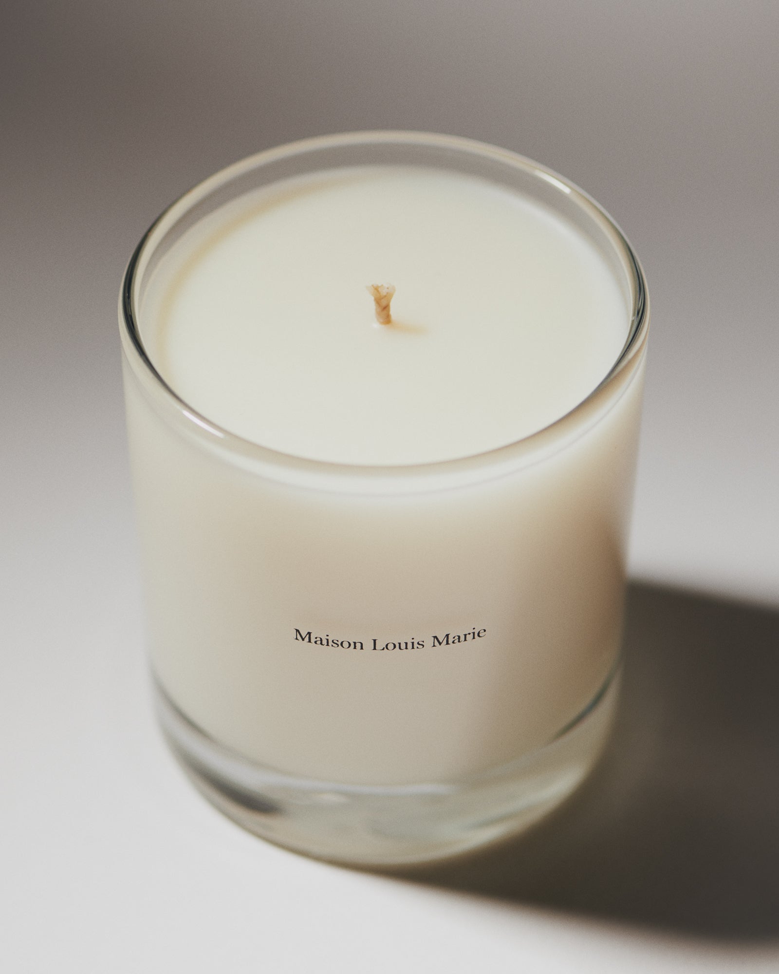 Maison Louis Marie No.04 Bois de Balincourt Candle — lit candle lifestyle