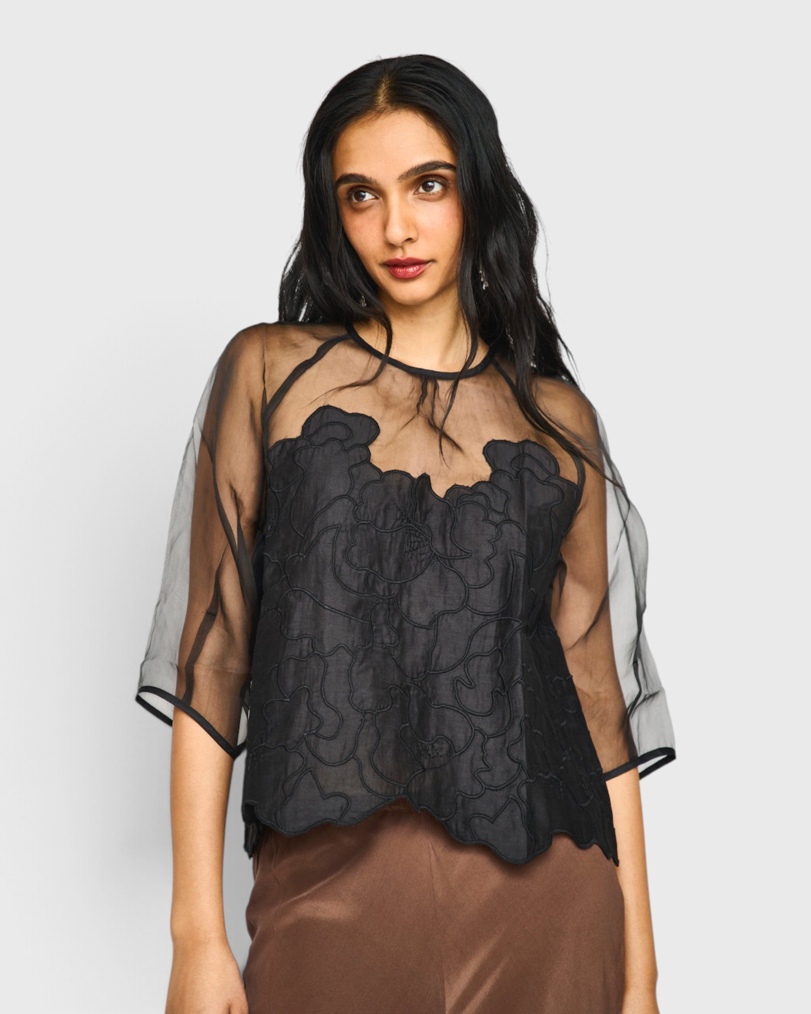 MIRTH Bari Organza Top in Black Waterlily — worn, close detail of the waterlily embroidery