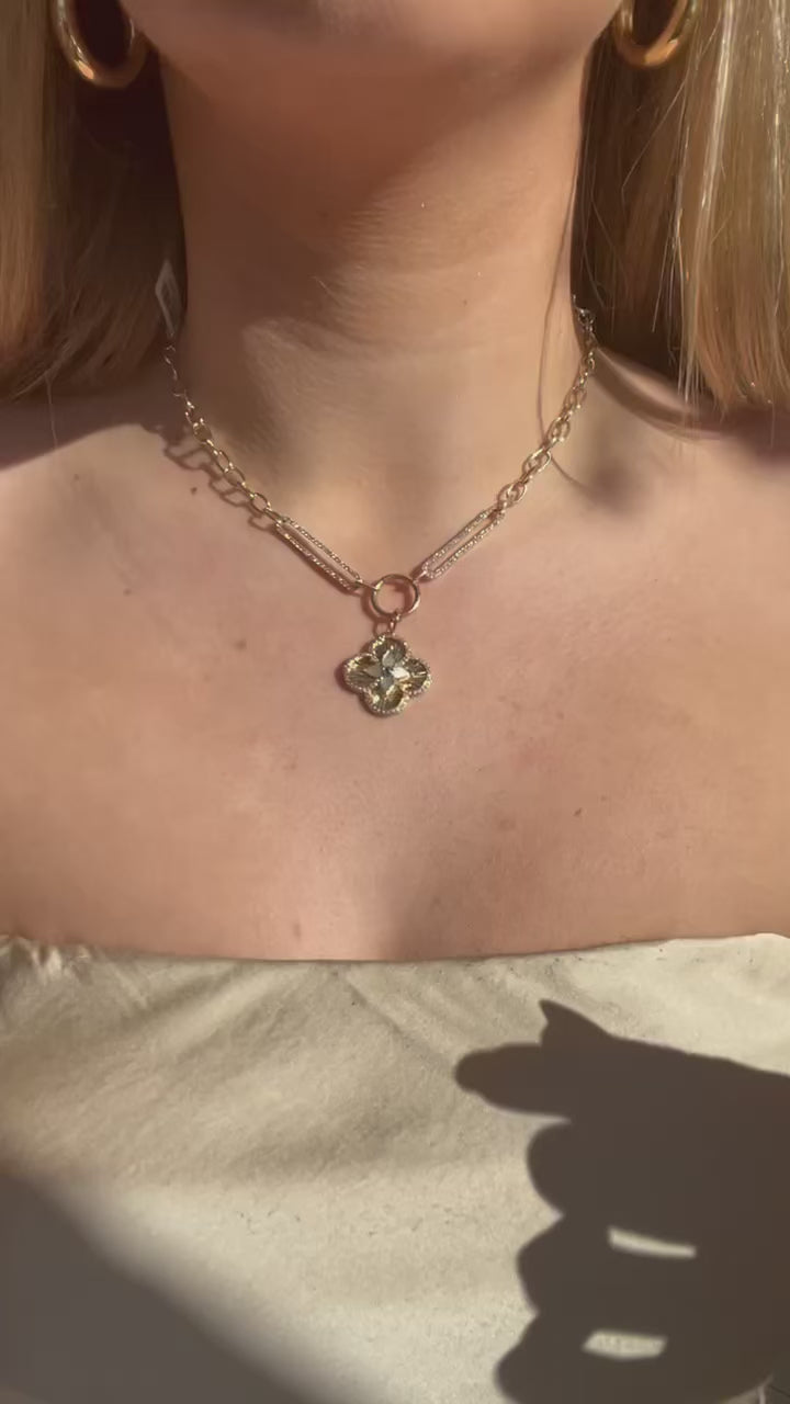 14K Clover Charms on the model