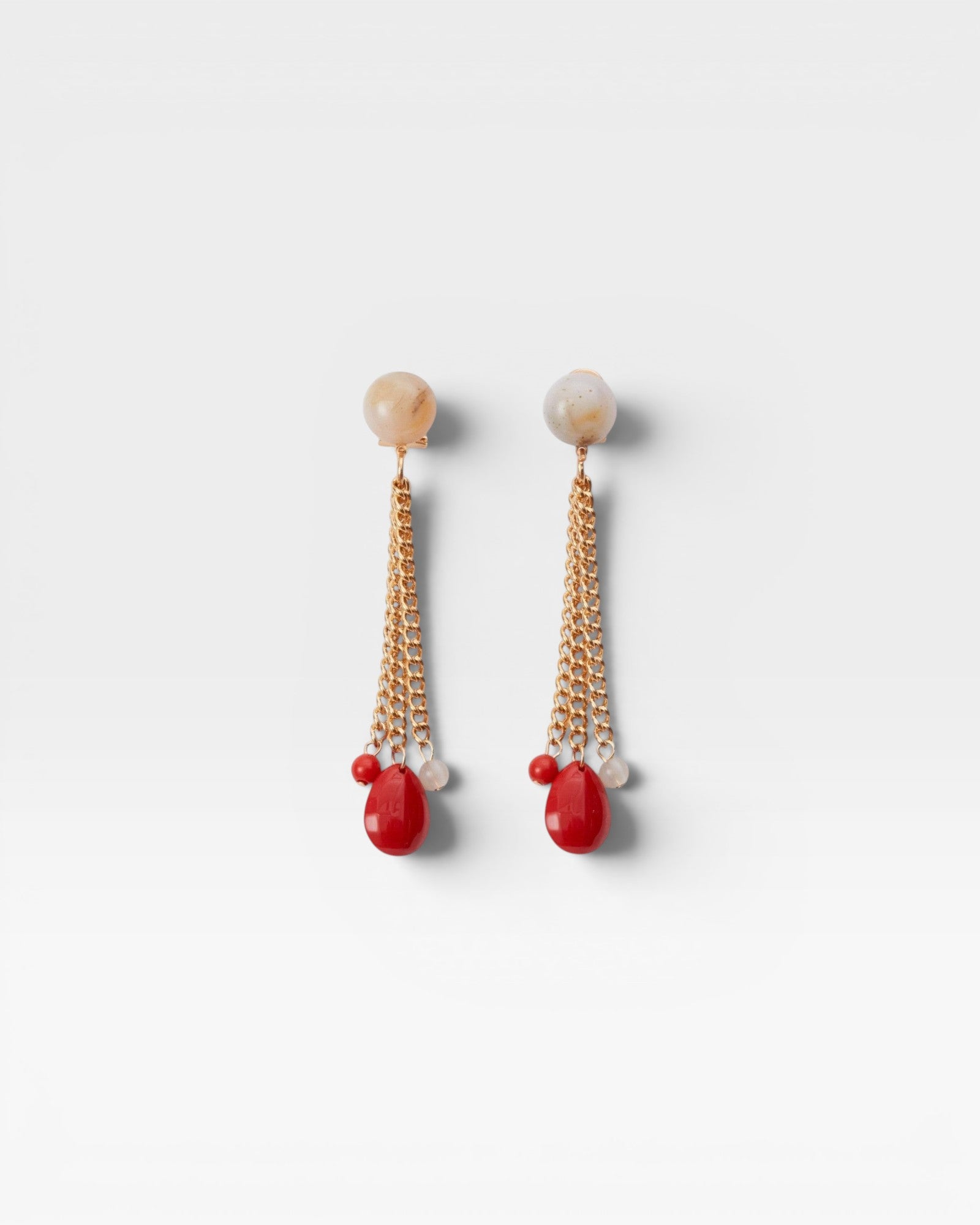 JONES + CO Bootes Earrings: Cream multi-colored spherical stud drop earrings with gold chains and red acrylic charms.
