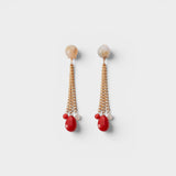 JONES + CO Bootes Earrings: Cream multi-colored spherical stud drop earrings with gold chains and red acrylic charms.