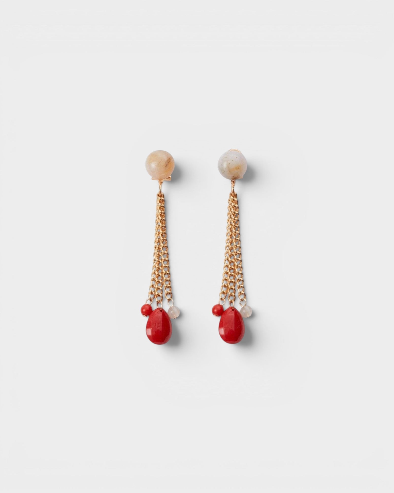 JONES + CO Bootes Earrings: Cream multi-colored spherical stud drop earrings with gold chains and red acrylic charms.