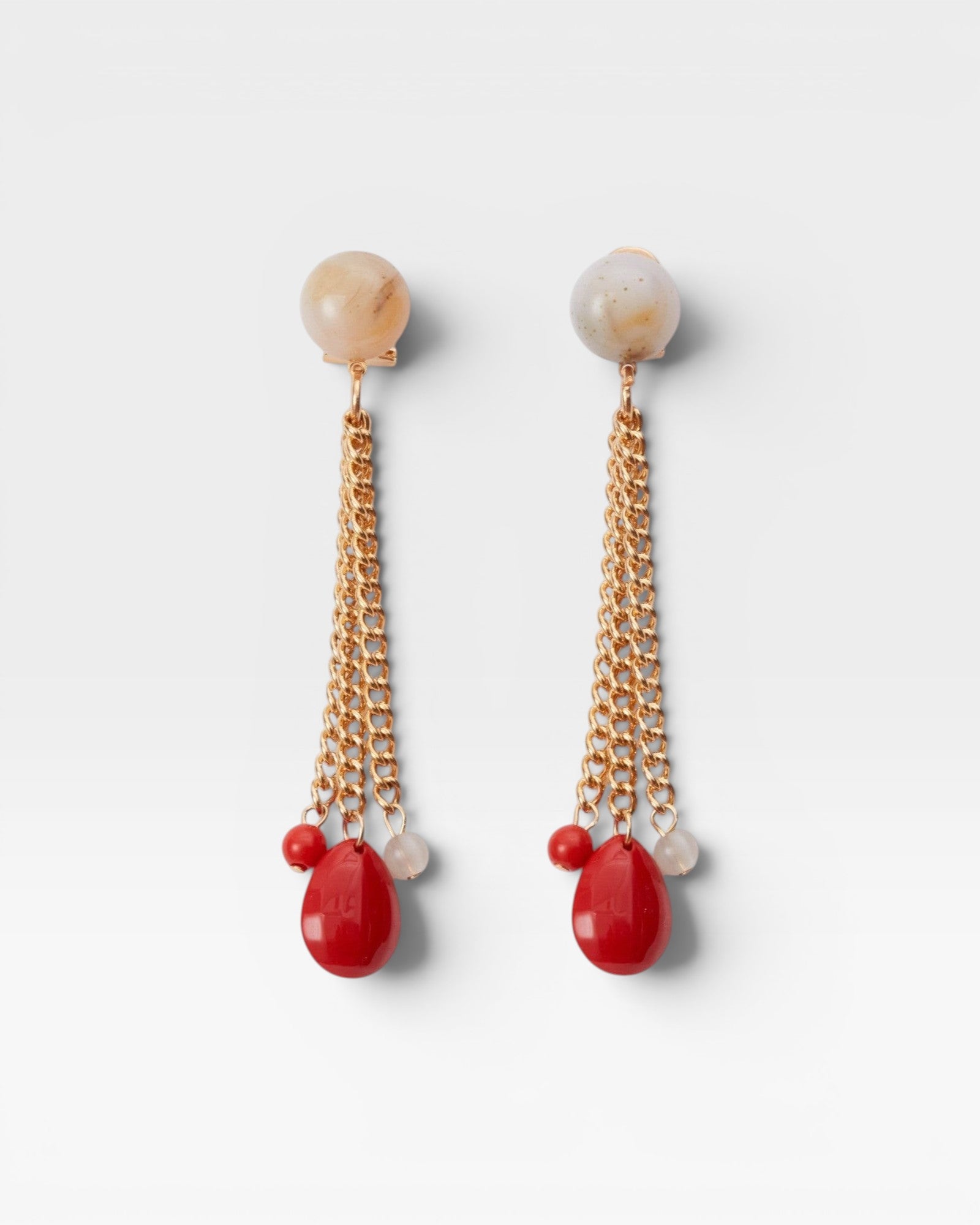 JONES + CO Bootes Earrings: Cream multi-colored spherical stud drop earrings with gold chains and red acrylic charms.