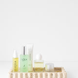 512 Tray - Travertine styled with beauty products on it 