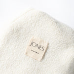 Tag inside of Parker Oversized Beanie in Cream