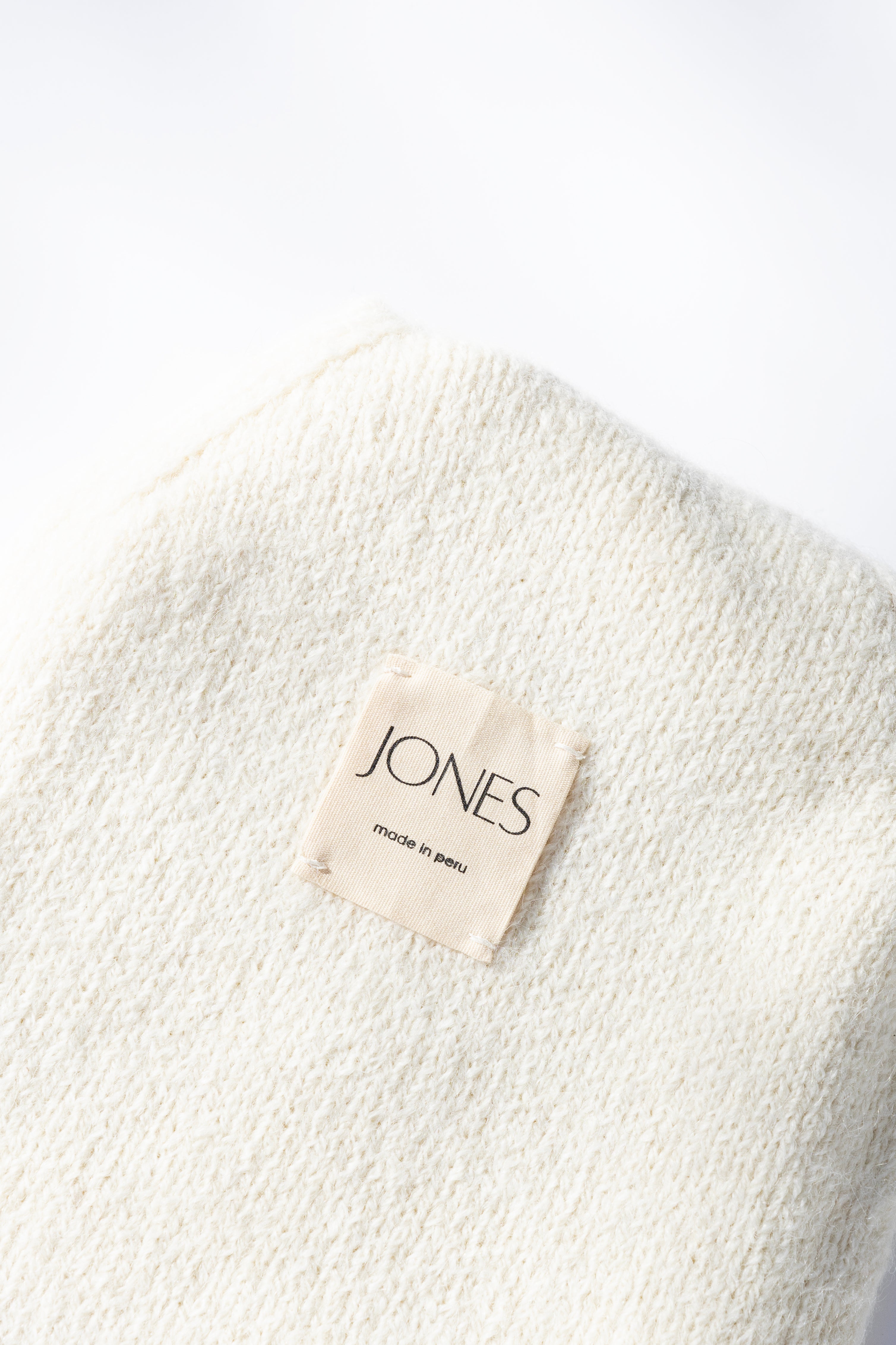 Tag inside of Parker Oversized Beanie in Cream