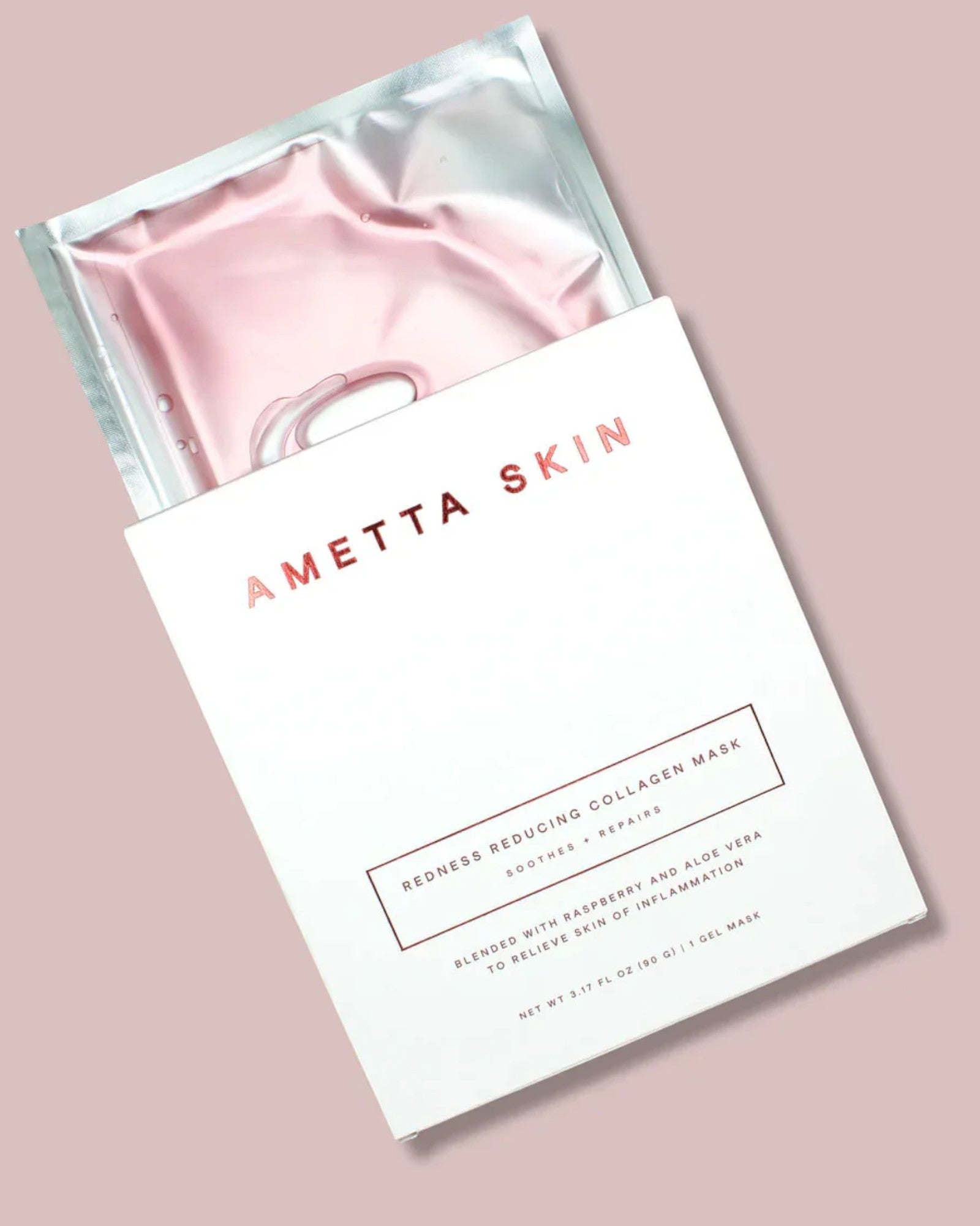 Ametta Skin pink collagen mask in packaging on a light pink background