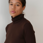 close up of brown turtleneck on model
