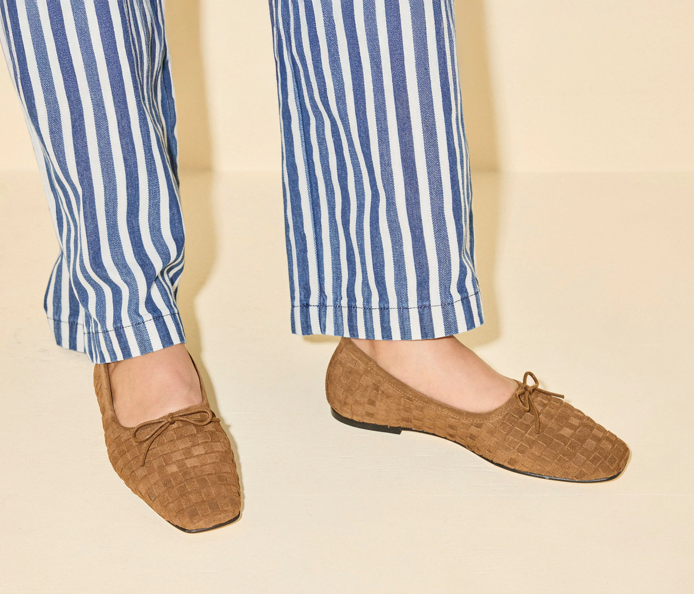 Jada Woven Suede Flats toffee on body of model 
