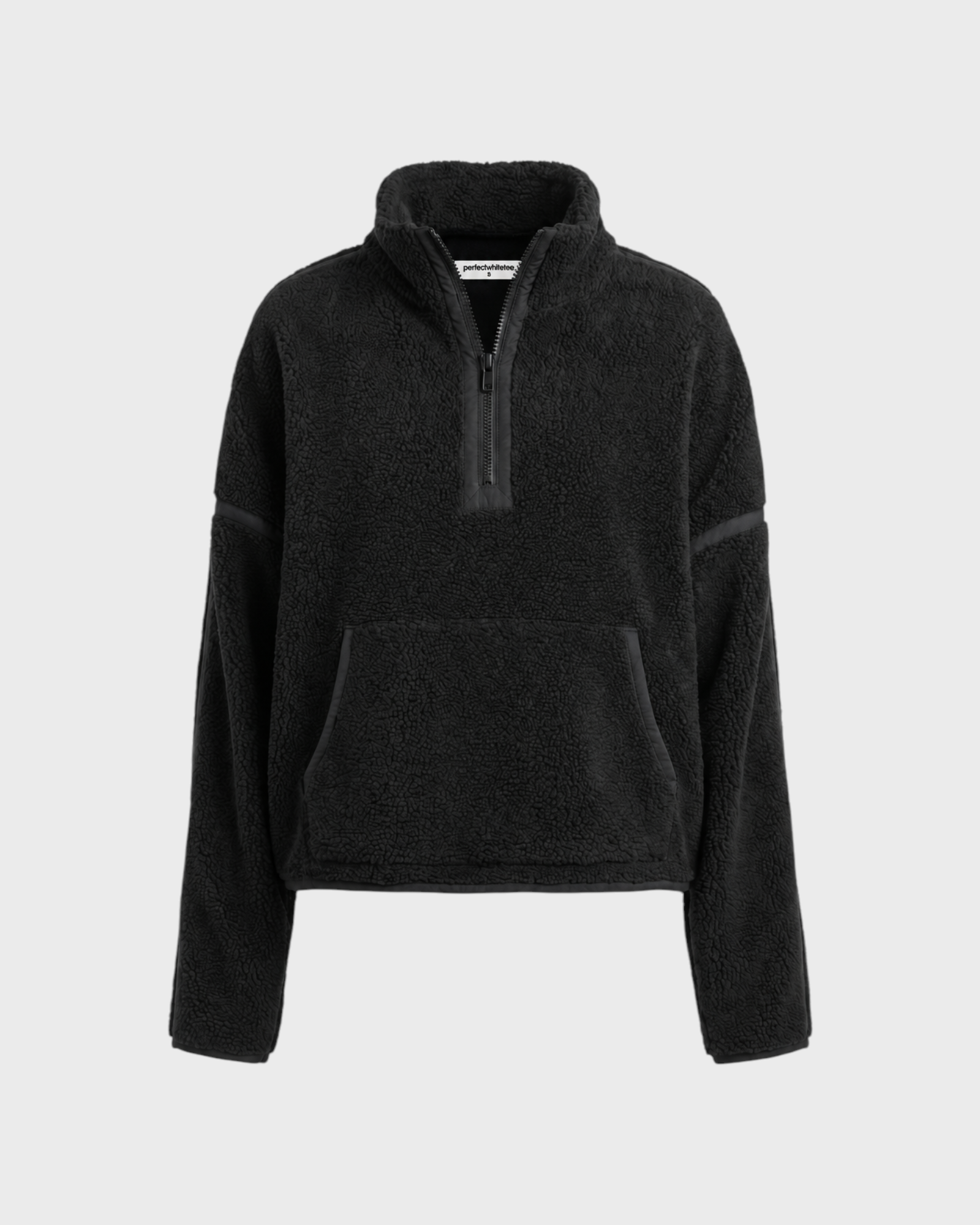 JONES + CO Tristan black sherpa half-zip pullover with a front kangaroo pocket and high collar.