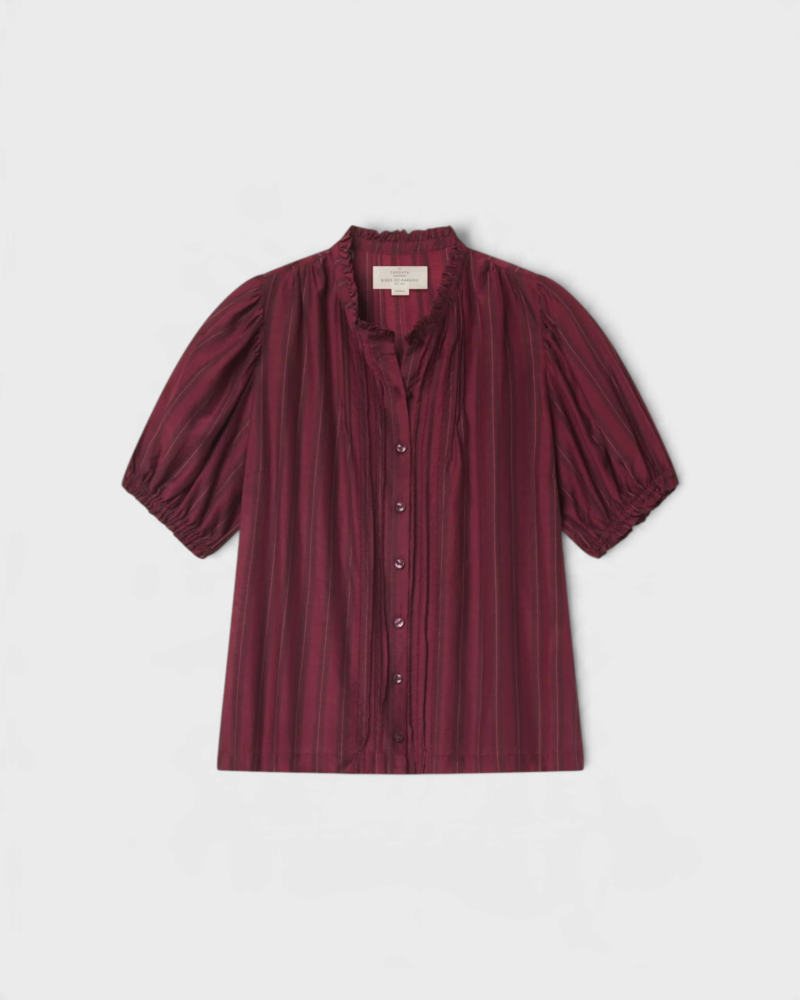 JONES + CO Mira blouse in garnet shadow-stripe with ruffled stand collar, pintucked bib, and short puffed sleeves.