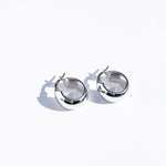 Flat image of 10k White Gold Boucle Hoops
