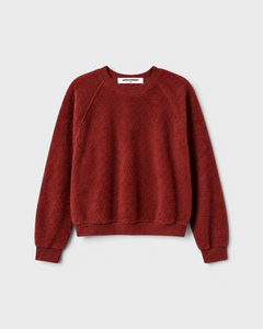 JONES + CO Ziggy sweatshirt in ruby red featuring a shrunken crewneck and textured inside-out fleece fabric.