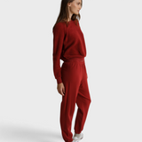 JONES + CO Ziggy sweatshirt in ruby red fleece with a shrunken crewneck worn by a model in matching joggers
