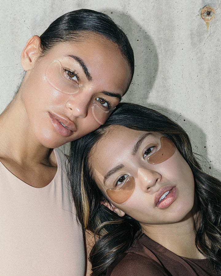 Plumping Eye Masks on model with red wine eye mask