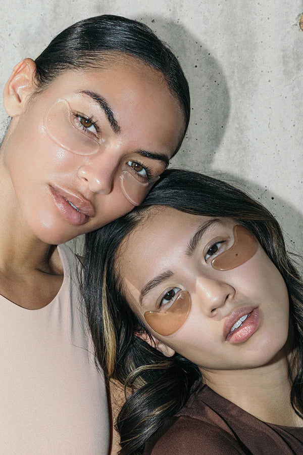 Plumping Eye Masks on model with red wine eye mask